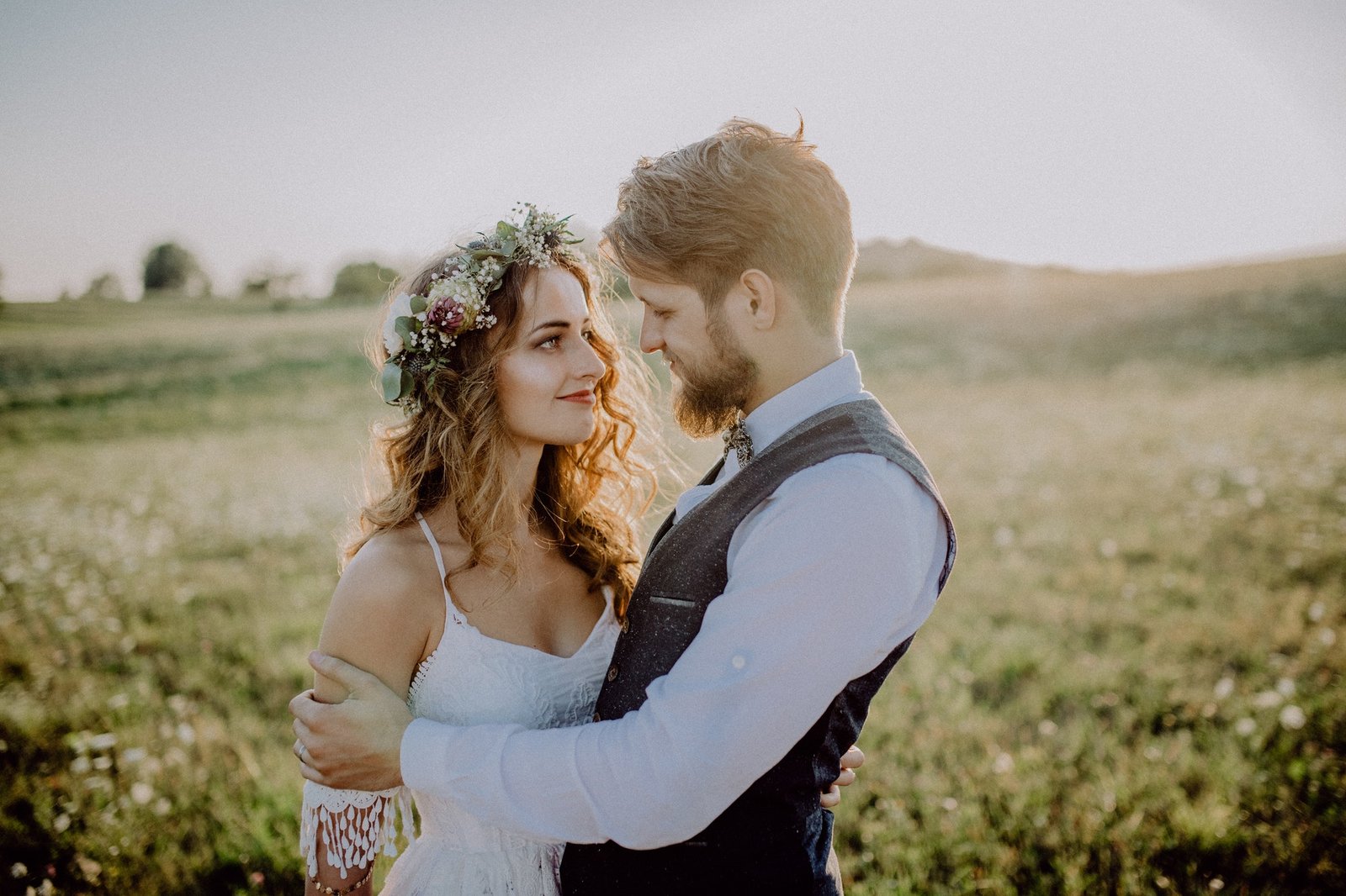 beautiful-bride-and-groom-at-sunset-in-green-nature-.jpg